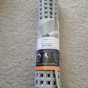 New, never used light gray bath/shower mat
